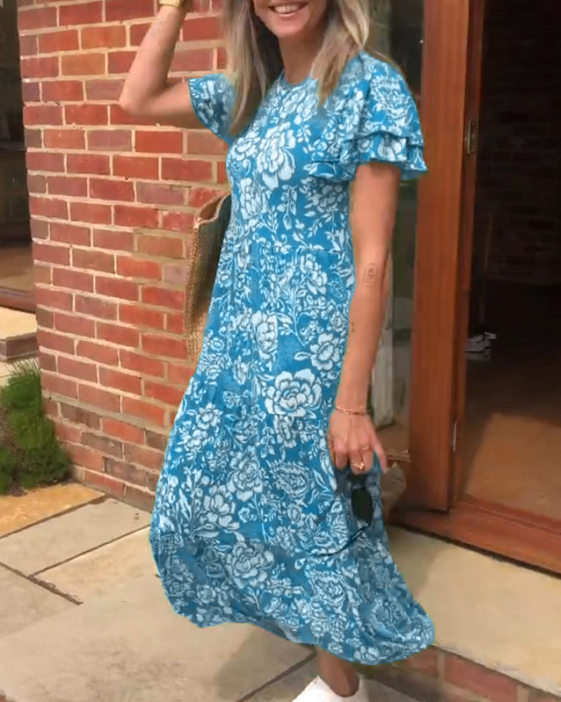 Van Delft Mode® | Lange jurk met korte mouwen en bloemenprint