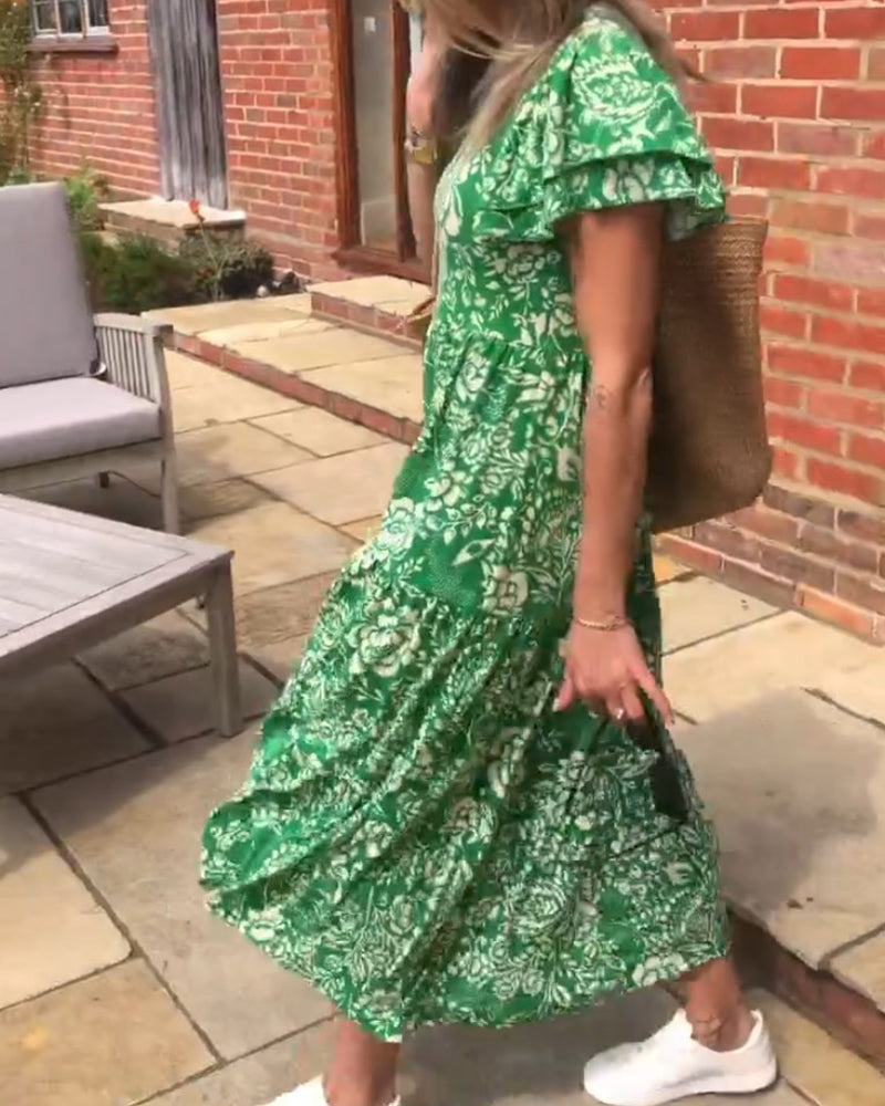 Van Delft Mode® | Lange jurk met korte mouwen en bloemenprint