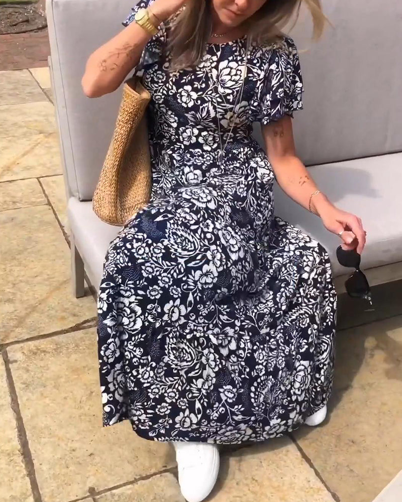 Van Delft Mode® | Lange jurk met korte mouwen en bloemenprint