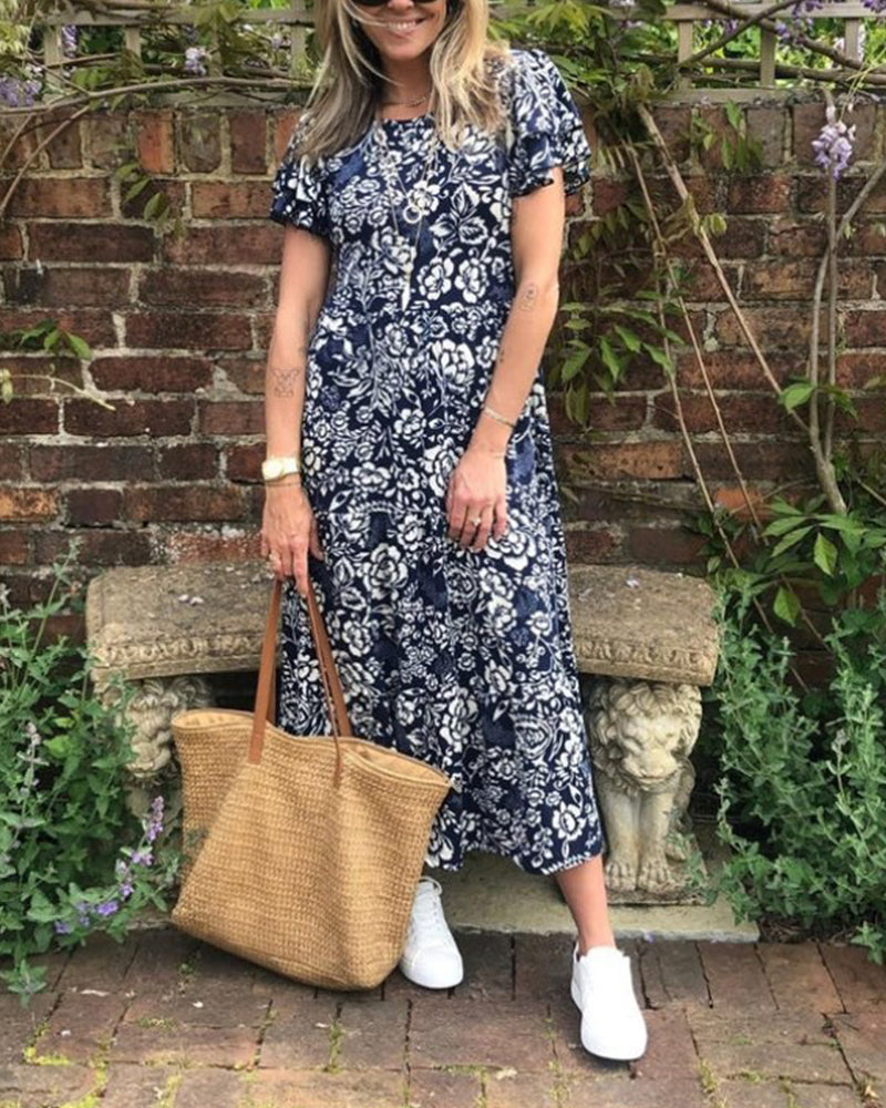 Van Delft Mode® | Lange jurk met korte mouwen en bloemenprint
