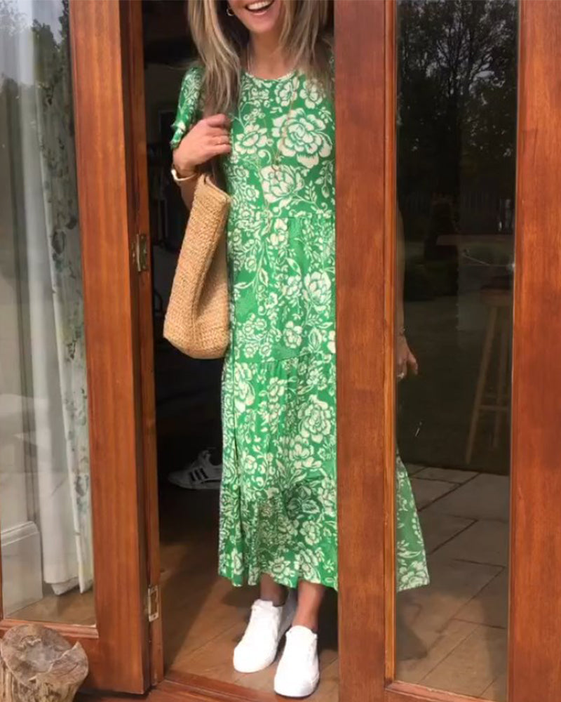 Van Delft Mode® | Lange jurk met korte mouwen en bloemenprint
