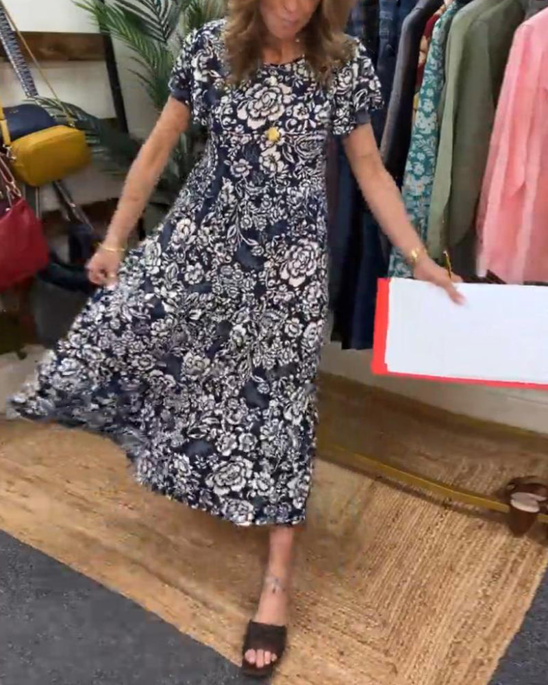 Van Delft Mode® | Lange jurk met korte mouwen en bloemenprint