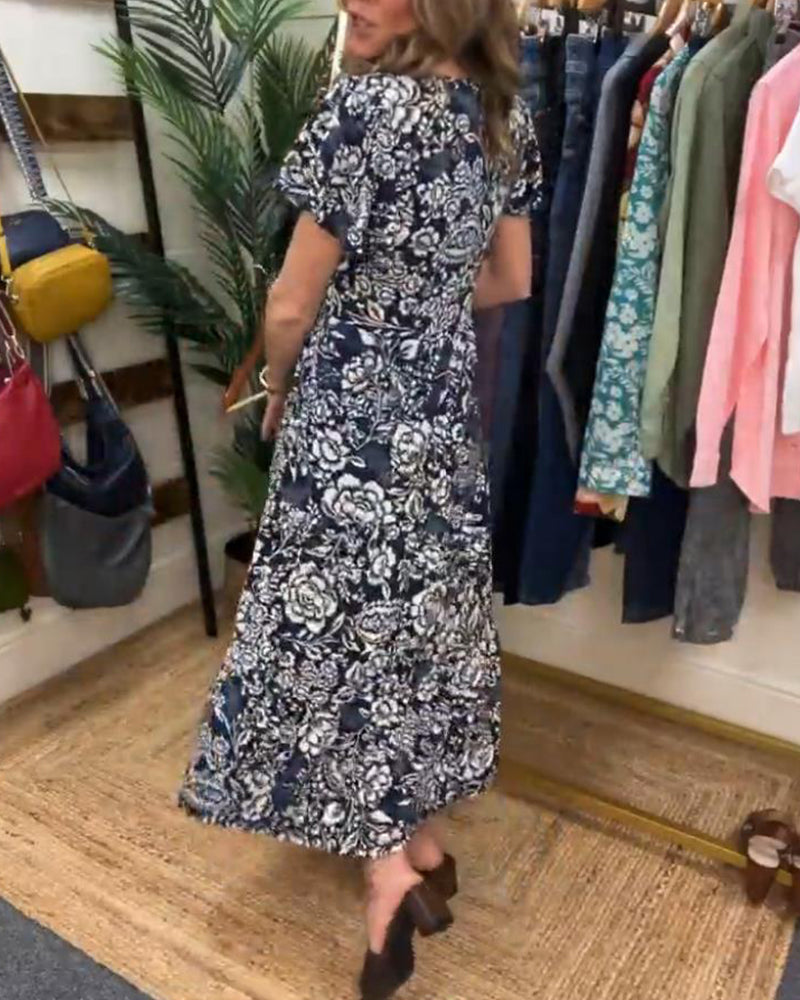 Van Delft Mode® | Lange jurk met korte mouwen en bloemenprint