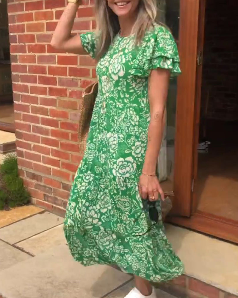Van Delft Mode® | Lange jurk met korte mouwen en bloemenprint
